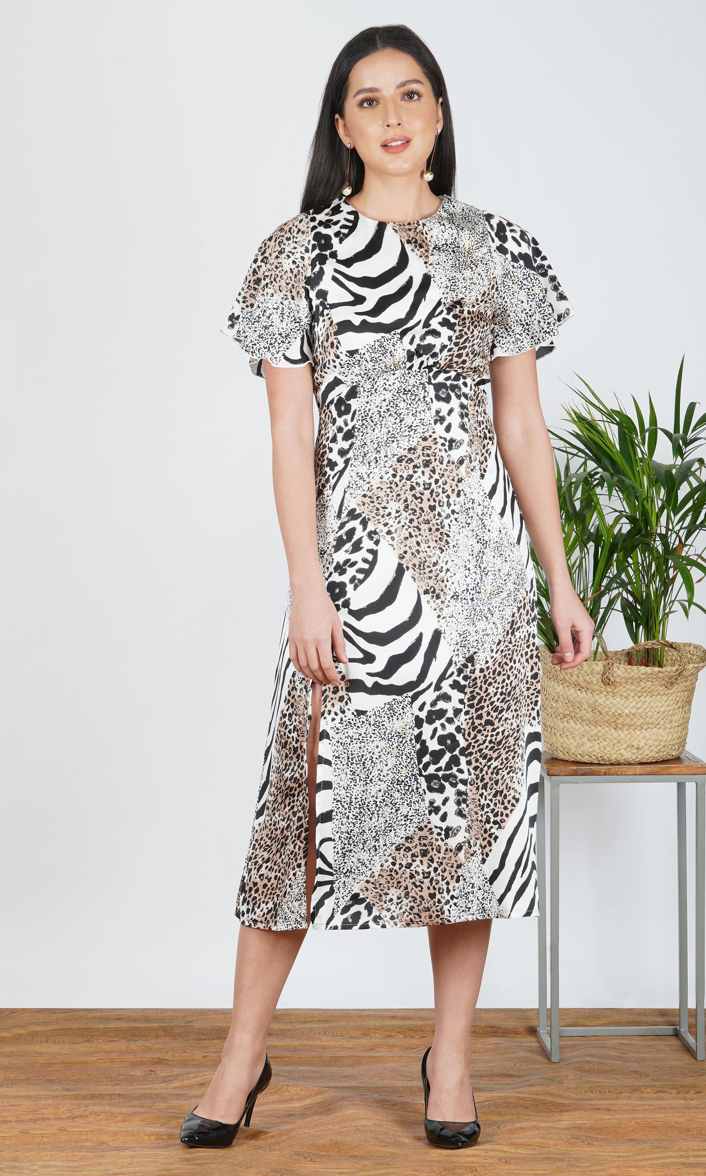 wild essence patchwork animal print midi dress