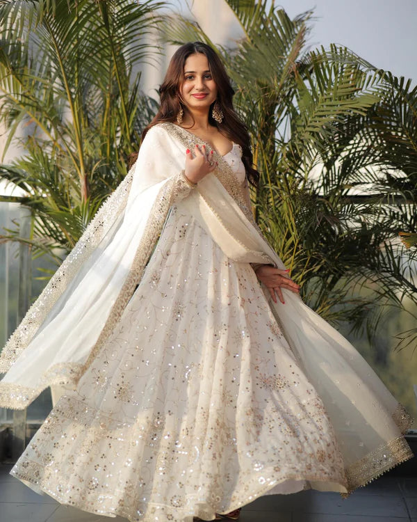 anika off white suit set with embroidery and sequnce work